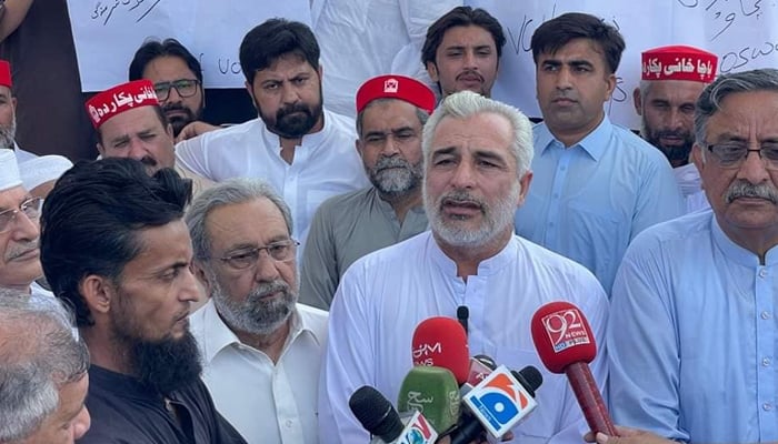 Press conference of Swabi Tehsil Razar Chairman Haji Malik Ghulam Haqqani in front of University of Swabi. — Facebook @MalikGhulamHaqaniOfficial/file