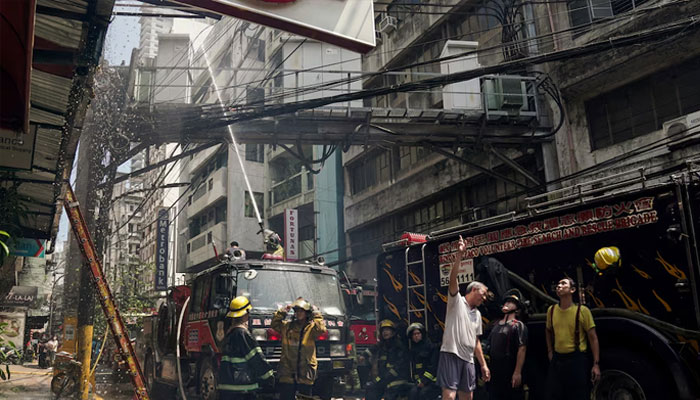 Firemen extinguish a fire at a building in Manila, Philippines, August 2, 2024. — Reuters