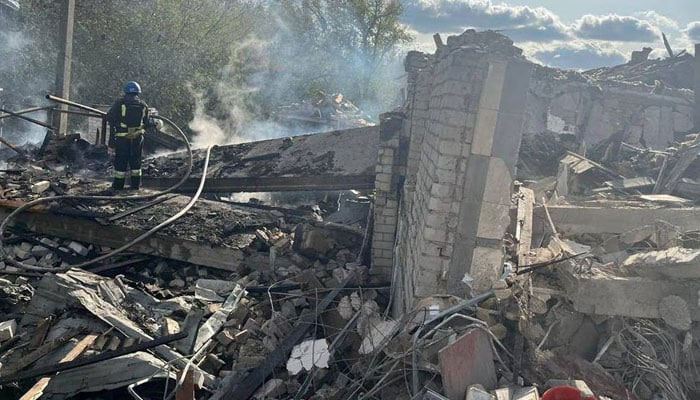 Firefighters work at a site of a Russian military strike, amid Russias attack on Ukraine, in the village of Hroza, in Kharkiv region, Ukraine October 5, 2023. — Reuters