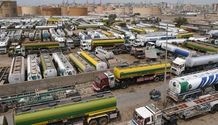 A representational image showing a large number of oil tankers parked at a site. — Online/File