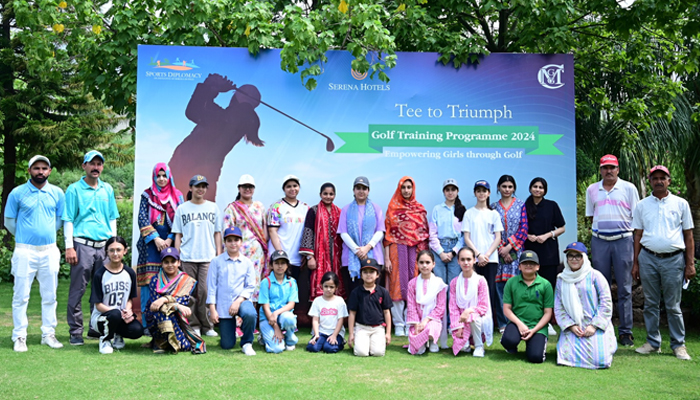 Children participating in Tee to Triumph golf training programme pose for a group photo at Margalla Greens Golf Club. — Facebook/@SerenaHotels/file