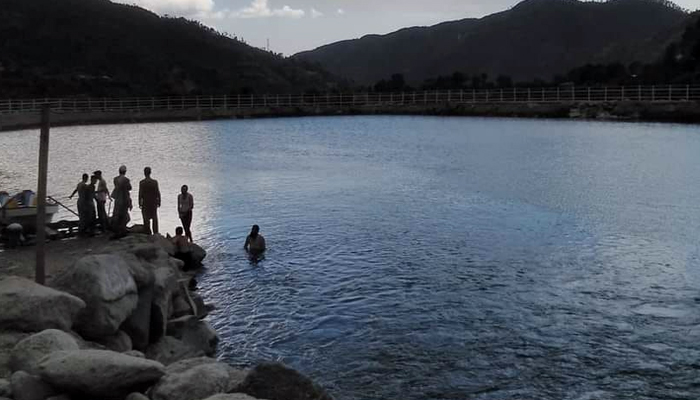 A representational image showing people at a lake in Mansehra, Khyber Pakhtunkhwa.  — Facebook/@siranjheel/file