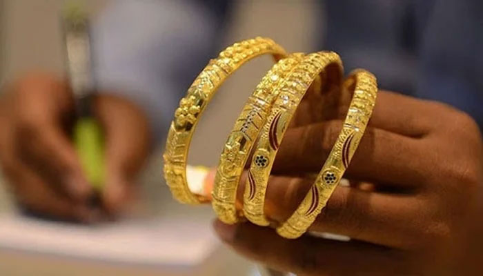 An undated image of gold bangles. — AFP/File