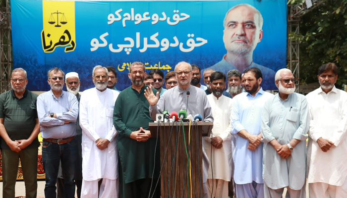 Jamat-e-Islami Pakistan emir Hafiz Naeemur Rehman (centre) is addressing a press conference outside the Governor House Sindh with others. — Facebook/@HafizNaeemRehman/file