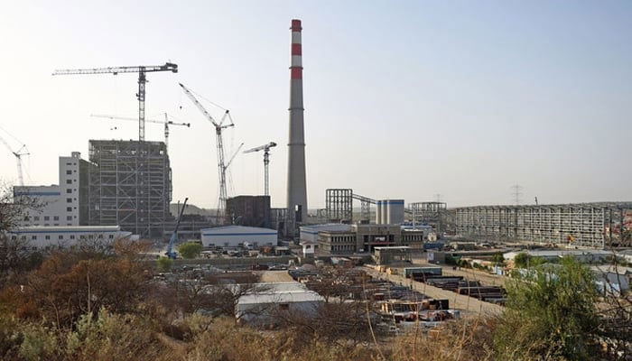 This photo shows a general view of a Chinese-backed power plant under construction in Islamkot in the desert in the Tharparkar district on May 23, 2018. — AFP