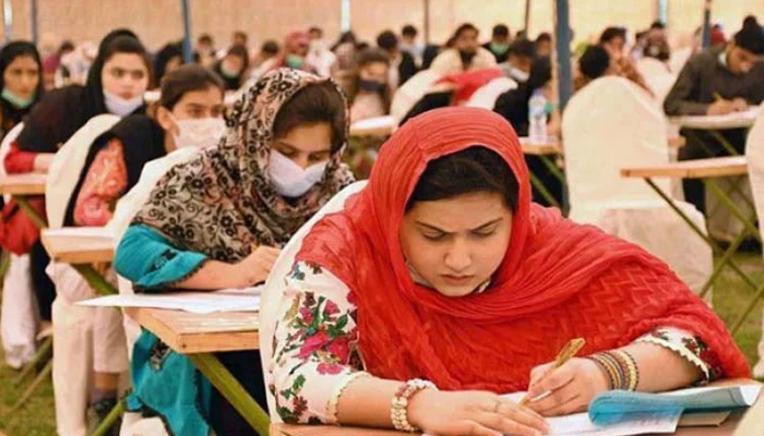 Representational image shows students taking an exam in the examination center. — APP/File