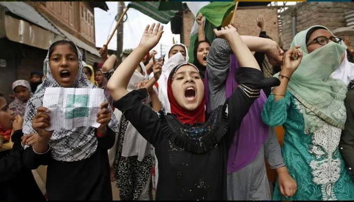 Kashmiris shout slogans during a protest after the Friday prayers in Illegally Occupied Jammu & Kashmir  — Reuters/File