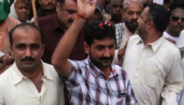 Uzair Baloch (centre) and other seen in this image. — Reuters/file