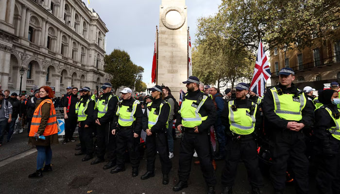 Representational image shows police personnel standing guard on the road in London, Britain, on October 28, 2023. — Reuters