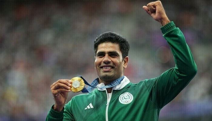 Arshad Nadeem smiles while holding his Olympic gold medal for the men’s javelin throw event at Stade de France, Paris, France, August 9, 2024. — Reuters