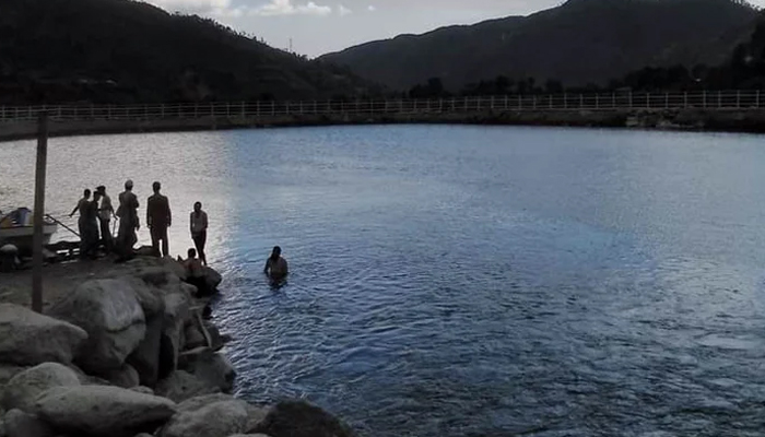 A representational image showing people at a lake in Mansehra, Khyber Pakhtunkhwa.  — Facebook/@siranjheel/file