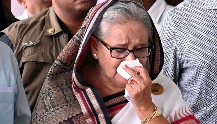 Bangladeshs now former prime minister Sheikh Hasina weeps while she visits a metro station in Mirpur vandalised by students during the anti-quota protests in this image released on July 25, 2024. — AFP