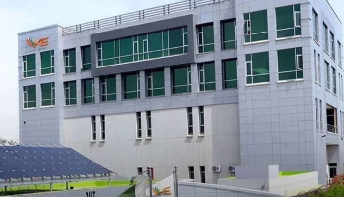 A view of the K-Electric head office, with solar panels at the parking area, in Karachi. — KE website/File