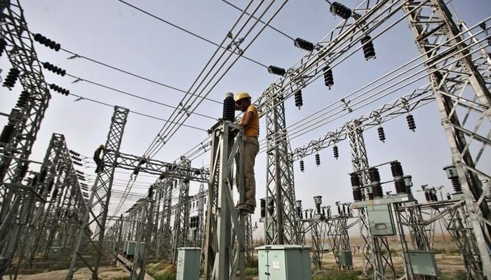 A representational image of a worker at a grid station in Hyderabad. — APP/File