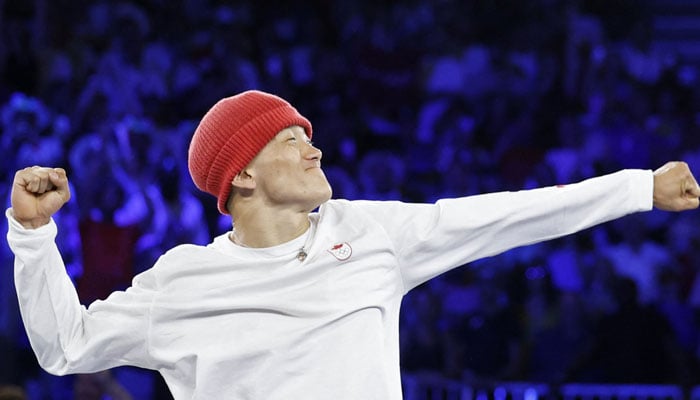 Canadas Philip Kim known as Phil Wizard celebrates his victory at the end of the Mens breakdancing gold medal battle at the Paris 2024 Olympic Games in Paris on August 10, 2024. — AFP