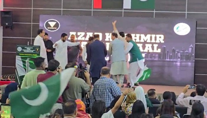 Members of the Pakistani community dance on stage during an event celebrating Pakistans 78th Independence Day at the Pakistan Social Center in Sharjah, UAE on August 11, 2024. — Reporter