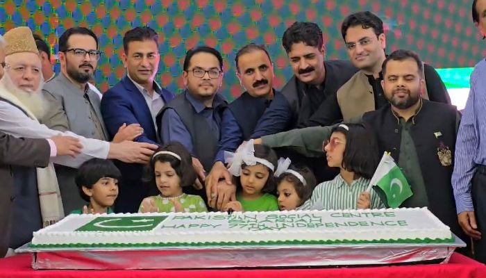 Members of the Pakistani community cut a cake to celebrate Pakistans 78th Independence Day at the Pakistan Social Center in Sharjah, UAE on August 11, 2024. — Reporter