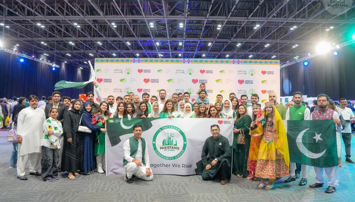 People pose for a photo to celebrate Pakistans Independence Day at the World Trade Centre in Dubai on August 12, 2024. — Facebook/Pakistanis in Dubai