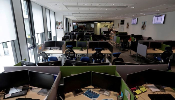 Open office workspace is seen in an empty office of an airline service company, as the spread of the coronavirus disease (COVID-19) continues, in Prague, Czech Republic, May 4, 2020. REUTERS