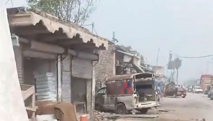 A police vehicle struck by an IED is seen in Peshawar, Khyber Pakhtunkhwa on August 16, 2024. — Screengrab via Geo News