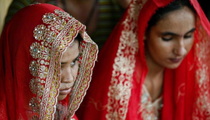 An undated image of 14-year-old child bride Shamila (left) seen in this image. — AFP/File