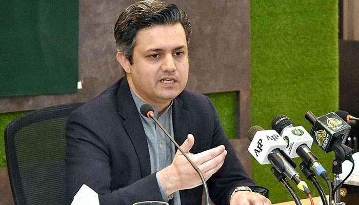 Former federal minister and PTI leader Hammad Azhar is addresses a press conference in this undated image. — PID/File