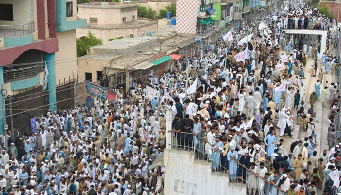 Residents take part in a peace rally to protest after the recent suicide attack by militants on an army enclave in Bannu, on July 19, 2024. — AFP