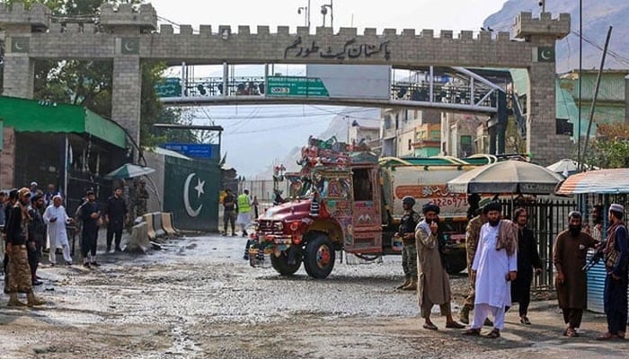 Taliban security personnel stand guard at the Pakistan-Afghanistan border in Torkham on September 15, 2023. — AFP