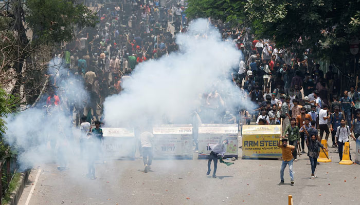 Police use tear gas during a clash between quota opponents, police and Awami League supporters in Rampura district of Dhaka, Bangladesh, July 18, 2024. — Reuters