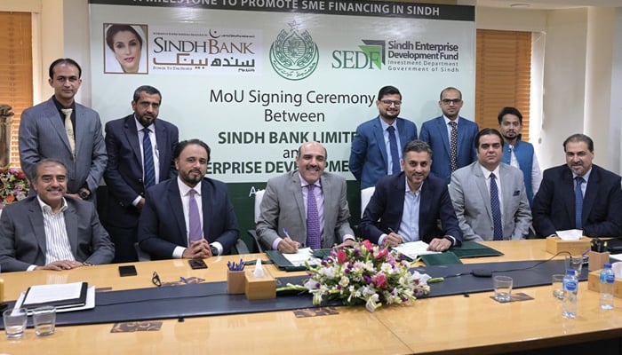 CEO Sindh Bank M Anwar Sheikh (centre) Syed Assad Ali, SEVP & Regional General Manager - Sindh and Balochistan (2nd from centre) and other officials of Sindh Bank Limited and Sindh Enterprise Development Fund (SEDF) released on August 19, 2024. — Facebook/@SindhBankLimitedOfficial