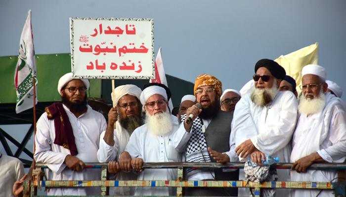 Jamiat Ulema-e-Islam-Fazl (JUI-F) leader Maulana Abdul Ghafoor Haideri (centre) addresses a protest in Islamabad on August 19, 2024. — Online