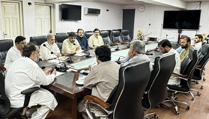 Khyber Pakhtunkhwa Minister of Health Syed Qasim Ali Shah (centre), DHO Dr. Javed Iqbal Deputy DHO Dr. Rahatullah and other seen in this image released on August 20, 2024. — Facebook/@SQasimAliShah