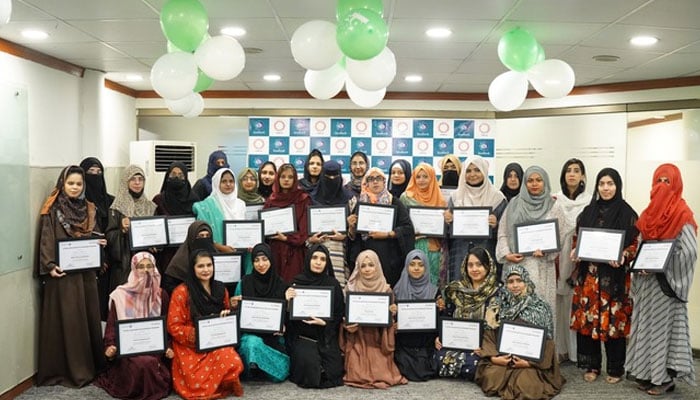 Participants pose for a group photo in relation to Faysal Khud Mukhtar Internship Programme (FKIP) initiative of the Faysal Bank. — Supplied/File