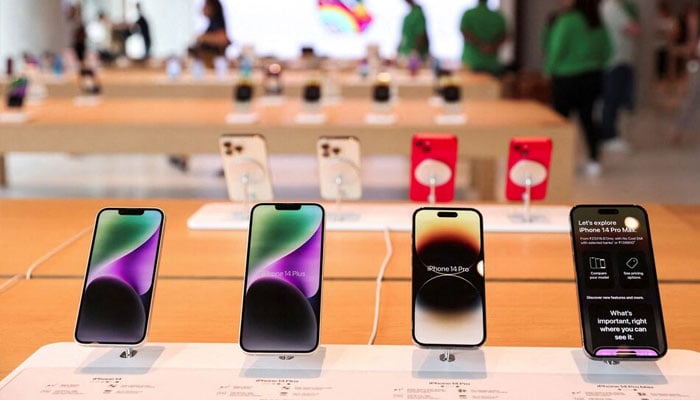 Apple iPhones are seen inside Indias first Apple-owned retail store during a media preview, a day ahead of its launch in Mumbai, India, April 17, 2023. — Reuters