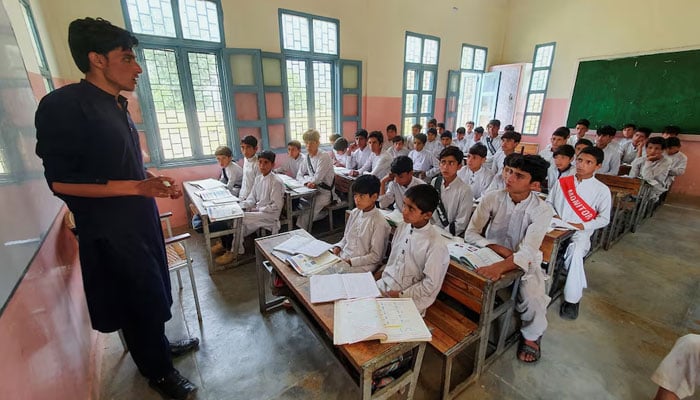 A representational image showing school students attending a class in Battagram, Khyber Pakhtunkhwa on August 23, 2023. — Reuters