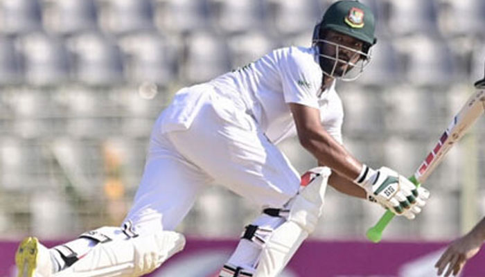 Bangladesh’s Najmul Hossain Shanto (left) plays a shot. — AFP/file