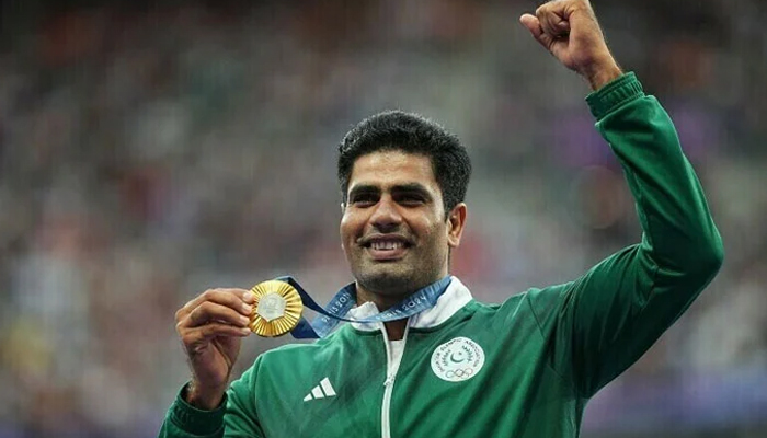 Arshad Nadeem smiles while holding his Olympic gold medal for the men’s javelin throw event at Stade de France, Paris, France, August 9, 2024. — Reuters