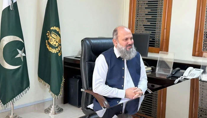 Federal Minister of Commerce Jam Kamal Khan gestures at his office on March 12, 2024. — Facebook/Jam Kamal Khan