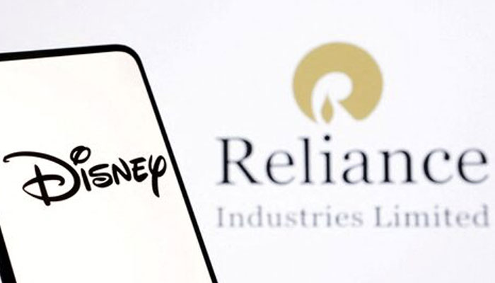 Disney and Reliance logos are seen in this illustration taken December 15, 2023. — Reuters