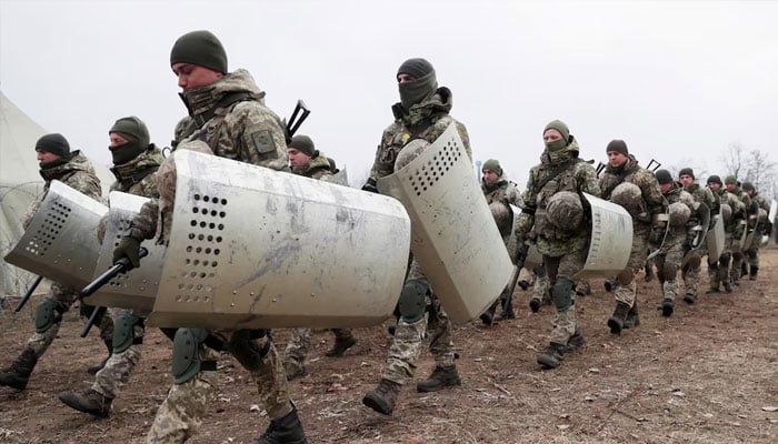 Members of the Ukrainian State Border Guard Service attend a training session near the border with Belarus and Poland in Volyn region, Ukraine November 16, 2021. — Reuters