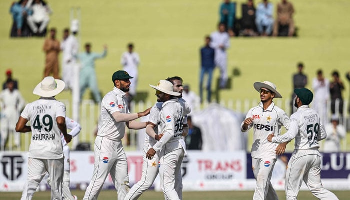 Pakistan´s players celebrate after the dismissal of Bangladesh´s Shadman Islam during the third day of the first Test cricket match between Pakistan and Bangladesh at the Rawalpindi Cricket Stadium on August 23, 2024. — AFP