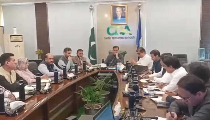 Chairman of the Capital Development Authority (CDA) Muhammad Ali Randhawa (centre) talks on revenue targets and ongoing development projects with CDA officials on August 23, 2024. — Screengrab/Facebook/@cda.isb.pk