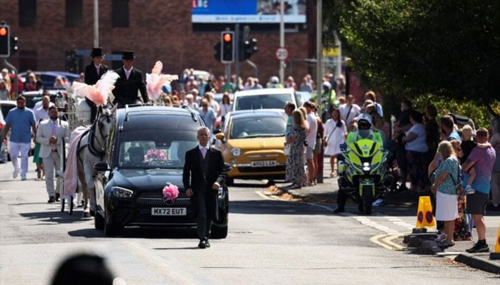 The coffin of Alice Dasilva Aguiar, one of the three children who were victims of a knife attack during a dance event, arrives at St Patricks Catholic Church, in Southport, Britain August 11, 2024. — Reuters