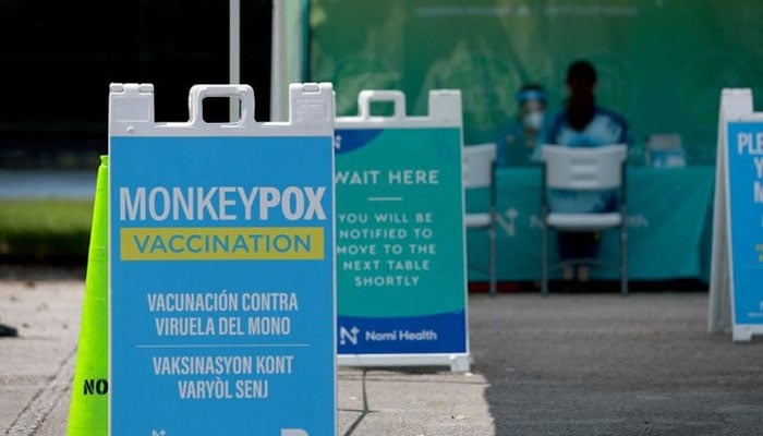 A sign announcing monkeypox vaccination is setup on August 15, 2022 — AFP