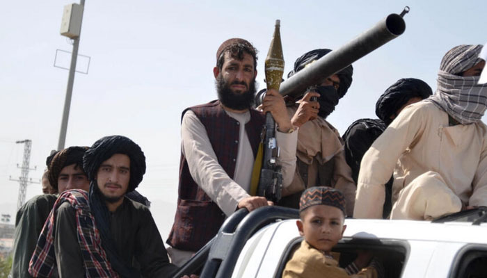 Taliban security personnel take part in a parade in Kandahar to celebrate the third anniversary of their takeover of Afghanistan. — AFP/File