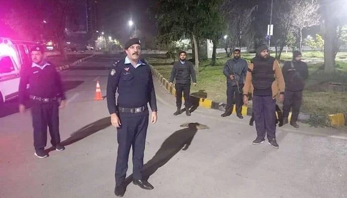 Islamabad police personnel seen at a checkpoint in the federal capital. — X/@ICT_Police/File