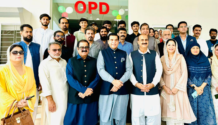 Former PM Raja Pervez Ashraf (centre) pose for a group photo with others during his visit to the newly constructed  Fatima Al Zahra Hospital on Chakri Road in this image released on August 24, 2024. — Facebook/Chaudhry Muhammad Yasin Official