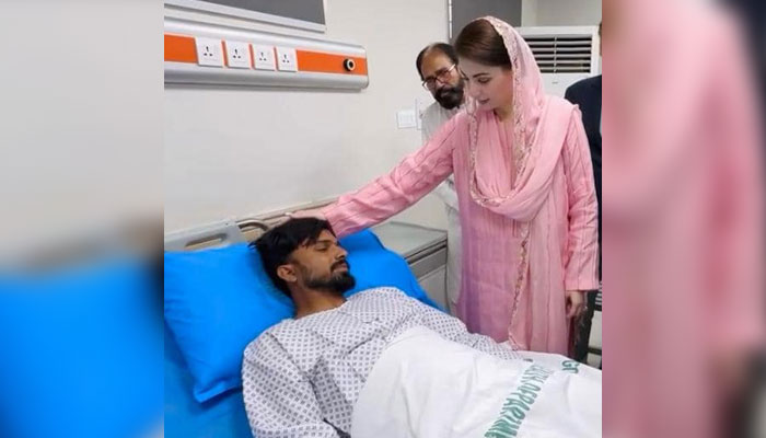 Punjab Chief Minister Maryam Nawaz speaks with an injured policeman during a visit to the Sheikh Zayed Hospital on August 24, 2024. — Facebook/Maryamazing