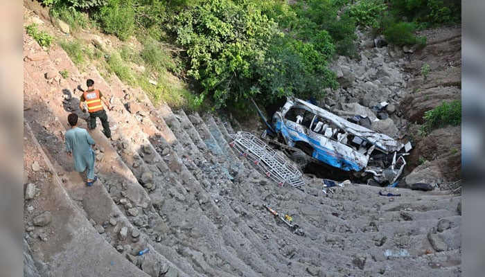 A view of the incident site where a passenger bus travelling from Rawalpindi to Palandri plunged into a deep ravine near Garari Bridge, Azad Pattan on August 25, 2024. — APP