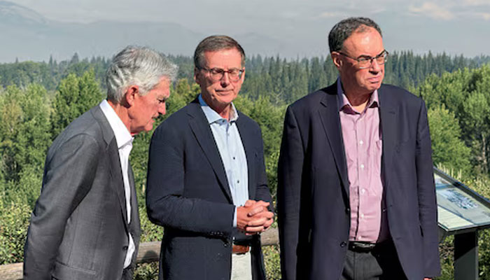 US Federal Reserve Chair Jerome Powell, Bank of England Governor Andrew Bailey, and Bank of Canada Governor Tiff Macklem take a break outside the Kansas City Feds annual economic symposium in Jackson Hole, Wyoming, US, August 23, 2024. — Reuters